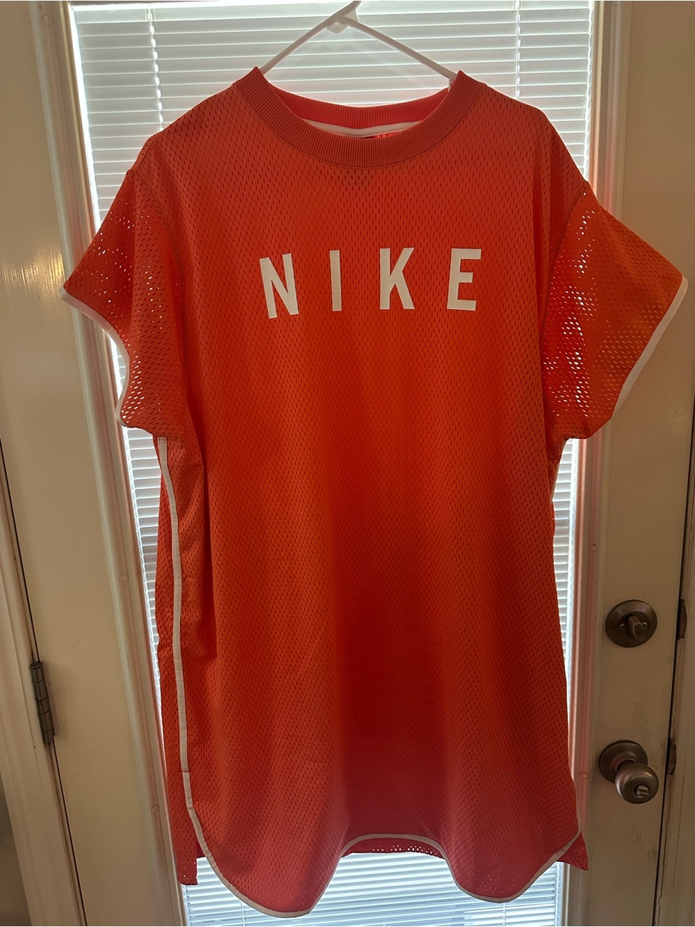 Nike Women's Bright Orange Mesh Athletic Jersey with White Logo
